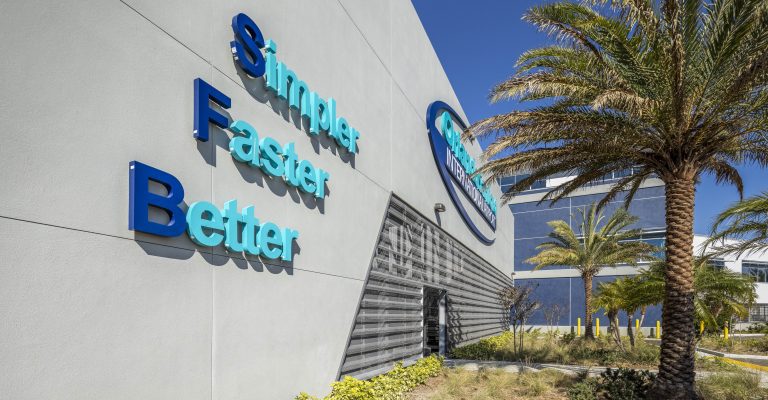 Simpler. Faster. Better. signage on building exterior